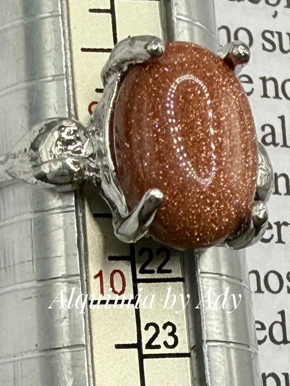 Sparkling Brown Goldstone Oval Ring in Silver-Tone Setting